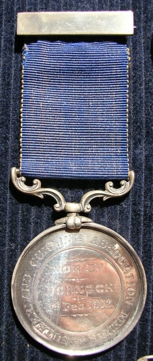 Dornoch Curling Club medal 1902