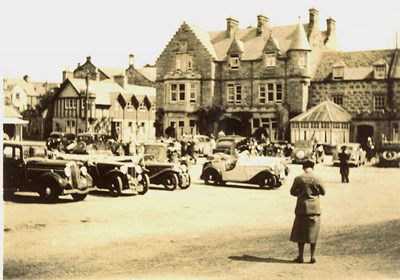 Motor rally in front of Sutherland Arms Hotel Dornoch