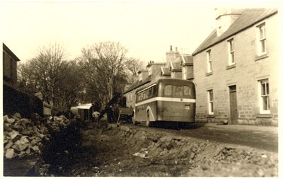 Bus negotiating road works Castle Street c1961