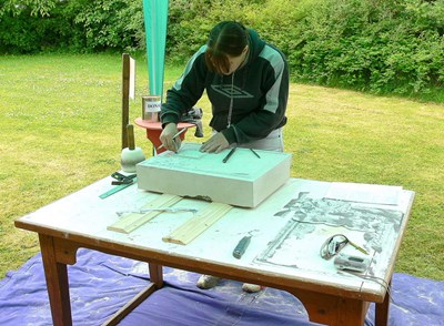 Demonstration of the making of the replica armorial stone