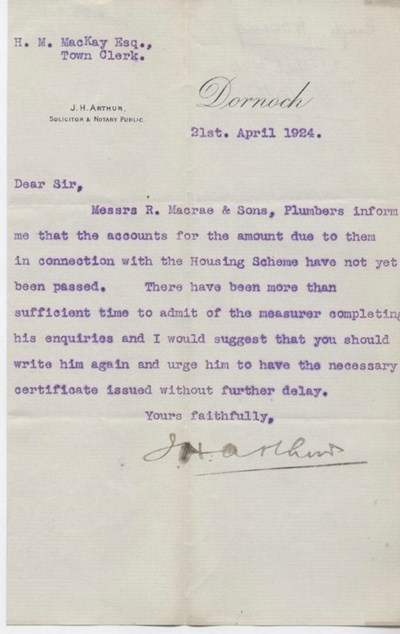 Letter re. late payment for housing scheme 1924